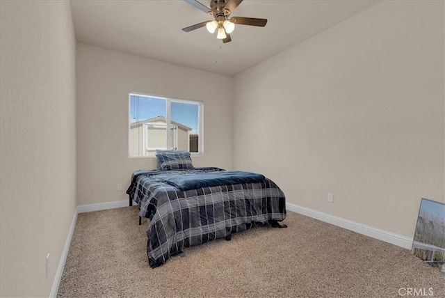 2454 W Mallard Ln, Hanford, CA 93230 - carpeted bedroom with baseboards and ceiling fan