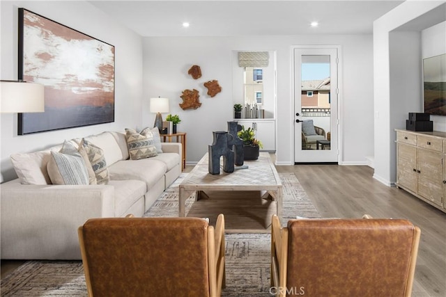16357 Sandpiper Ave, Chino, CA 91708 - living room featuring wood finished floors and recessed lighting