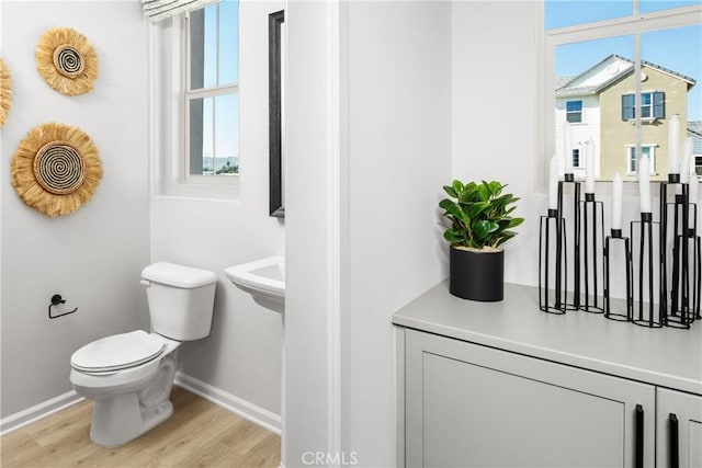 16357 Sandpiper Ave, Chino, CA 91708 - half bathroom with plenty of natural light and wood finished floors