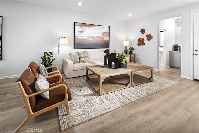 16357 Sandpiper Ave, Chino, CA 91708 - living area featuring wood finished floors and recessed lighting