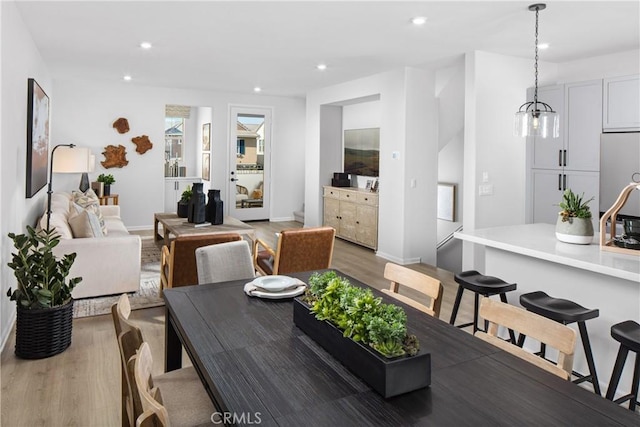 16357 Sandpiper Ave, Chino, CA 91708 - dining room featuring light wood-style flooring and recessed lighting