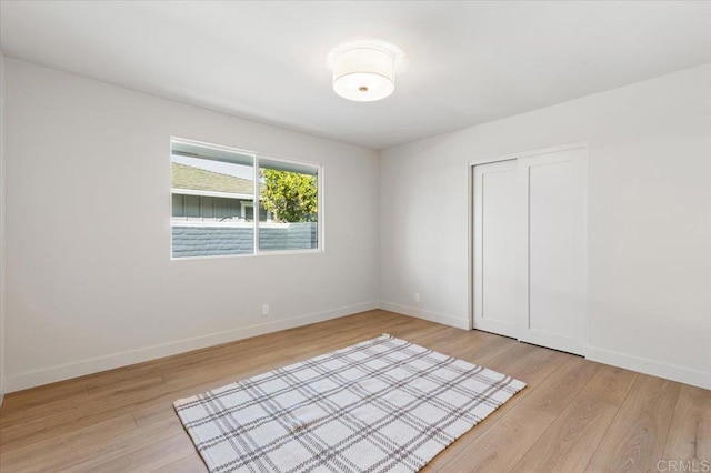 1515 San Pablo Dr, San Marcos, CA 92078 - unfurnished bedroom with wood finished floors and a closet