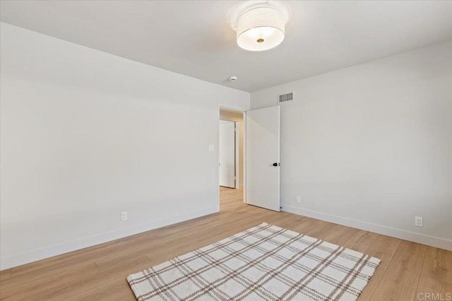 1515 San Pablo Dr, San Marcos, CA 92078 - empty room with light wood-style floors and baseboards
