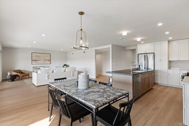 1515 San Pablo Dr, San Marcos, CA 92078 - dining room featuring light wood-type flooring and recessed lighting