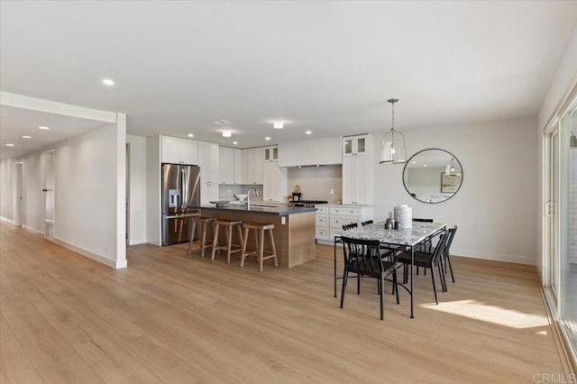 1515 San Pablo Dr, San Marcos, CA 92078 - dining space featuring light wood-style flooring and recessed lighting