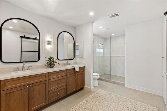 1515 San Pablo Dr, San Marcos, CA 92078 - bathroom featuring a tile shower, double vanity, tile patterned floors, and recessed lighting