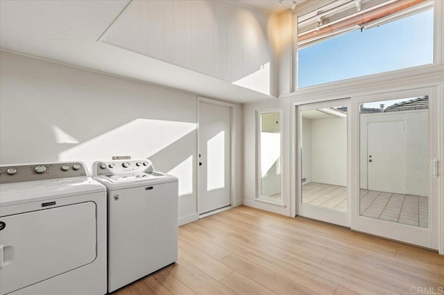 1515 San Pablo Dr, San Marcos, CA 92078 - laundry room featuring washer and dryer and light wood-style flooring