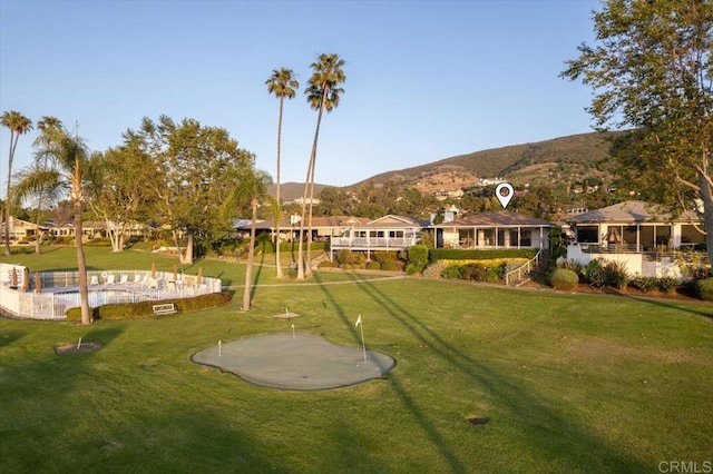 1515 San Pablo Dr, San Marcos, CA 92078 - exterior space with a putting area, a mountain view, a lawn, and a residential view