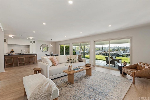 1515 San Pablo Dr, San Marcos, CA 92078 - living room with plenty of natural light, light wood finished floors, and recessed lighting