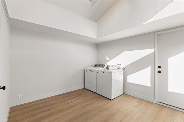 1515 San Pablo Dr, San Marcos, CA 92078 - laundry area with light wood-style floors and independent washer and dryer