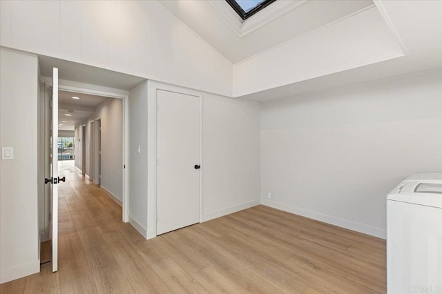 1515 San Pablo Dr, San Marcos, CA 92078 - laundry room with washer / clothes dryer, light wood-type flooring, and a skylight