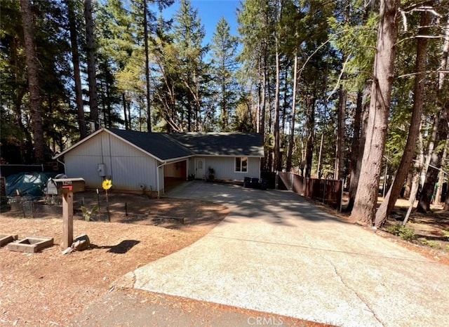 1290 Tuck Rd, Willits, CA 95490 - ranch-style house with concrete driveway and an attached carport