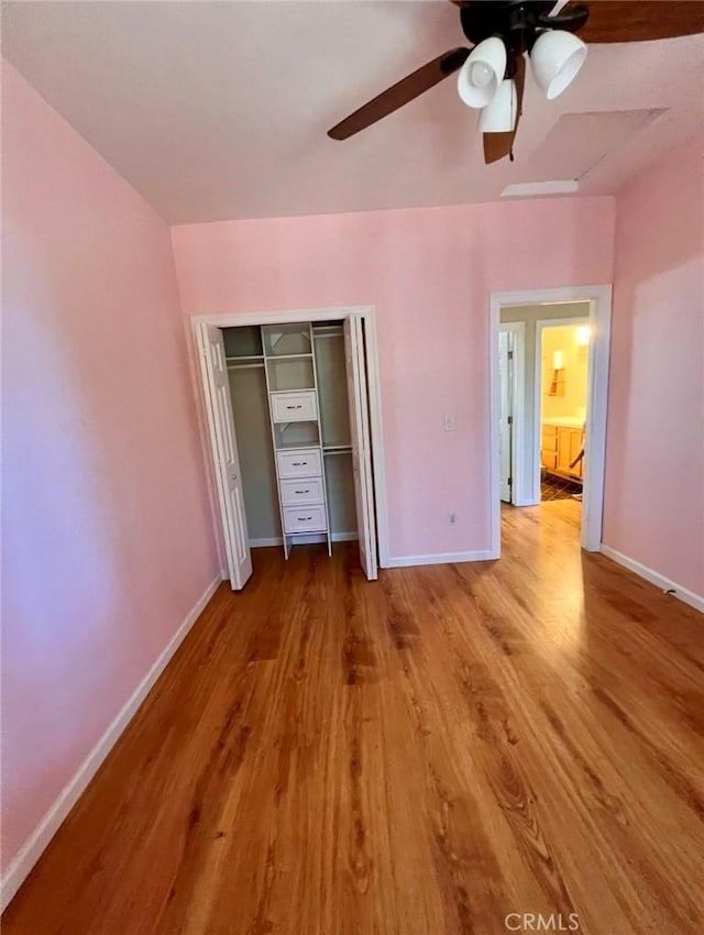 1290 Tuck Rd, Willits, CA 95490 - unfurnished bedroom featuring wood finished floors, a closet, and a ceiling fan