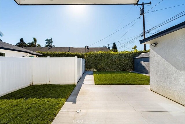4851 Faculty Ave, Long Beach, CA 90808 - fenced backyard featuring a patio area