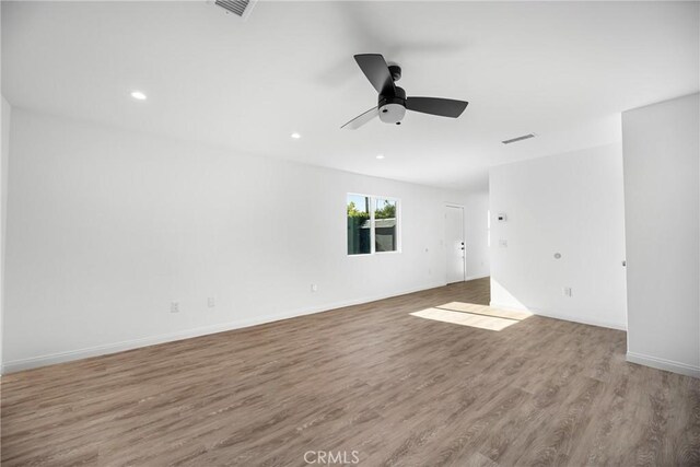4851 Faculty Ave, Long Beach, CA 90808 - spare room featuring ceiling fan, wood finished floors, and recessed lighting