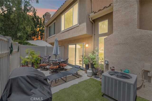 13208 Setting Sun Ct, Chino Hills, CA 91709 - back of house with stucco siding, a patio area, and outdoor dining space