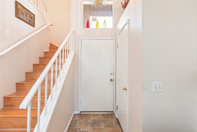 13208 Setting Sun Ct, Chino Hills, CA 91709 - foyer entrance with stairs and a chandelier