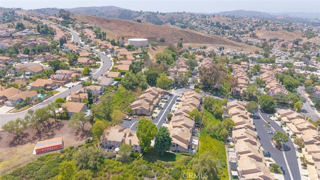 13208 Setting Sun Ct, Chino Hills, CA 91709 - aerial view of property and surrounding area with a mountainous background and nearby suburban area