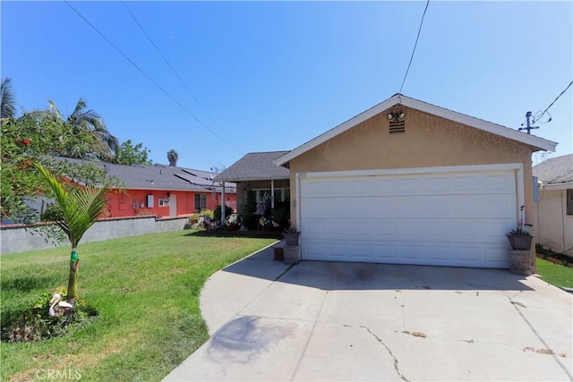 4981 Tulsa Ave, Riverside, CA 92505 - ranch-style home featuring a front yard, driveway, stucco siding, and an attached garage