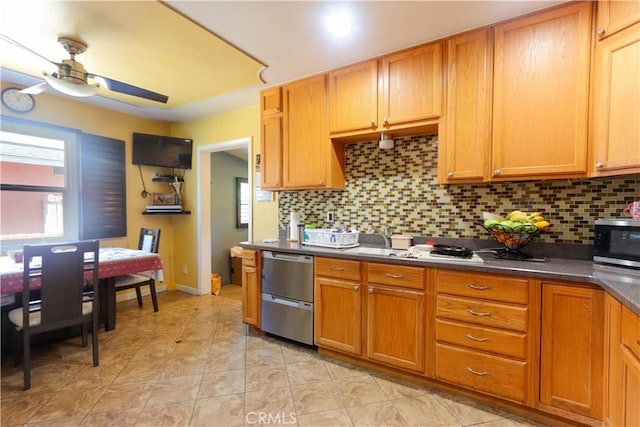 4981 Tulsa Ave, Riverside, CA 92505 - kitchen with stainless steel appliances, a ceiling fan, healthy amount of natural light, and decorative backsplash