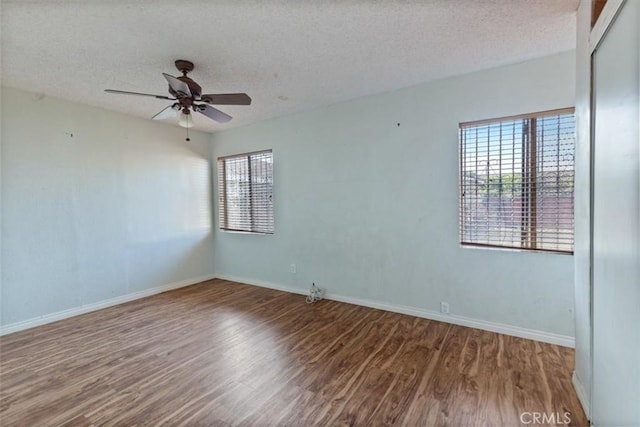 347 E 97th St, Los Angeles, CA 90003 - unfurnished room with wood finished floors, a textured ceiling, and ceiling fan