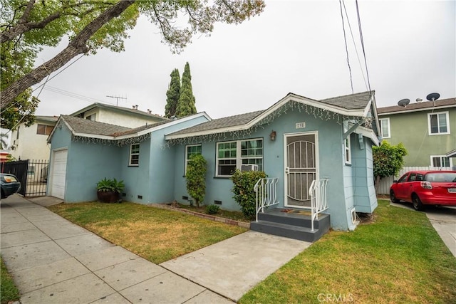 290 W 19th St, Long Beach, CA 90806 - view of front of house featuring a garage, stucco siding, crawl space, and roof with shingles