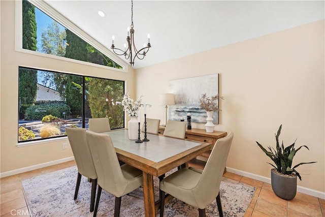 24002 Plover Ln, Laguna Niguel, CA 92677 - dining space with a chandelier, light tile patterned floors, high vaulted ceiling, and recessed lighting