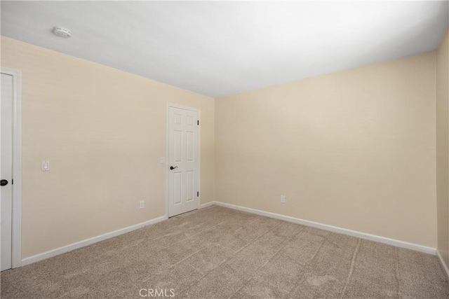 24002 Plover Ln, Laguna Niguel, CA 92677 - unfurnished room featuring light carpet and a smoke detector