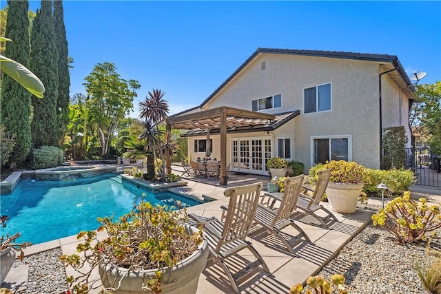 24002 Plover Ln, Laguna Niguel, CA 92677 - view of swimming pool with french doors, a patio, and a pool with connected hot tub