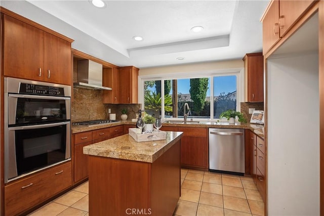 24002 Plover Ln, Laguna Niguel, CA 92677 - kitchen featuring appliances with stainless steel finishes, wall chimney exhaust hood, light tile patterned floors, decorative backsplash, and brown cabinets