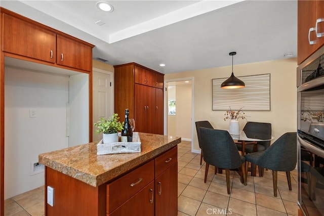 24002 Plover Ln, Laguna Niguel, CA 92677 - kitchen with light tile patterned floors, a center island, recessed lighting, and pendant lighting