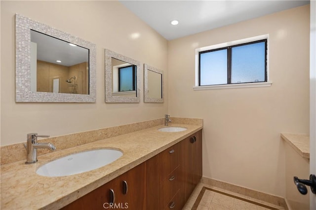 24002 Plover Ln, Laguna Niguel, CA 92677 - full bathroom featuring inlaid floor details, double vanity, tile patterned flooring, a shower, and recessed lighting