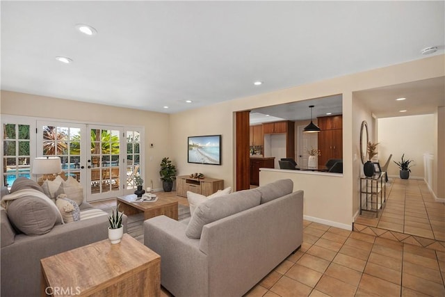 24002 Plover Ln, Laguna Niguel, CA 92677 - living room with light tile patterned floors, recessed lighting, and french doors