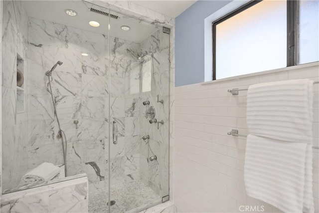 24002 Plover Ln, Laguna Niguel, CA 92677 - full bathroom with a marble finish shower and tile walls