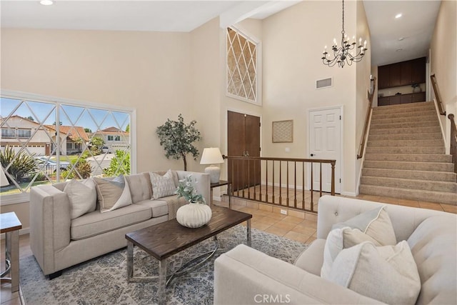 24002 Plover Ln, Laguna Niguel, CA 92677 - living room with a chandelier, tile patterned flooring, stairway, a towering ceiling, and recessed lighting