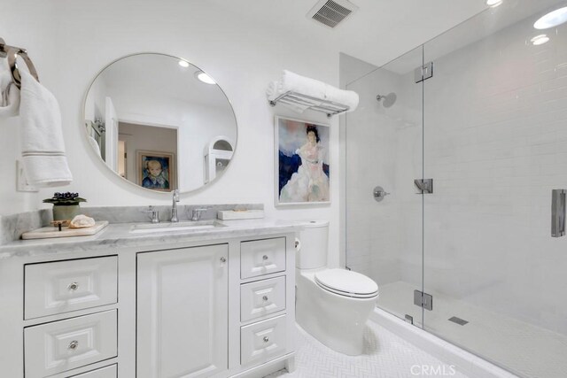 23451 Friar St, Woodland Hills, CA 91367 - full bathroom featuring a shower stall, vanity, and tile patterned floors