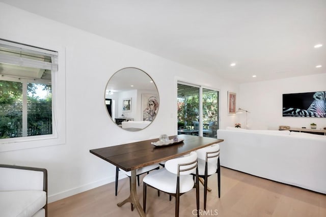 23451 Friar St, Woodland Hills, CA 91367 - dining area with light wood-type flooring and recessed lighting