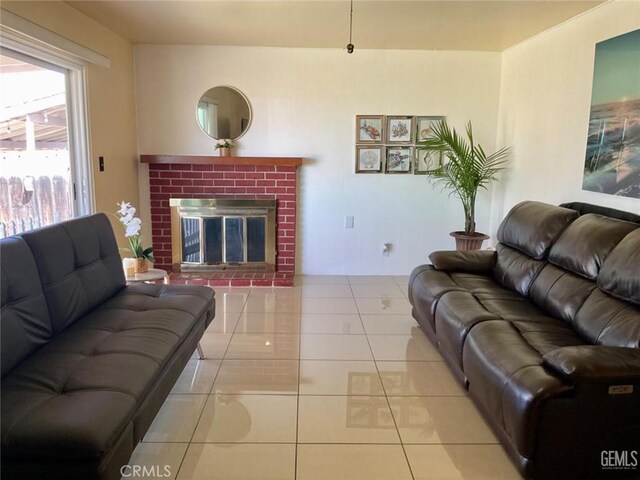 2720 Baylor St, Bakersfield, CA 93305 - tiled living area featuring a brick fireplace