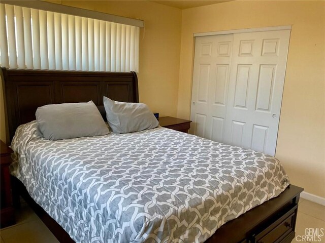 2720 Baylor St, Bakersfield, CA 93305 - bedroom featuring a closet and baseboards