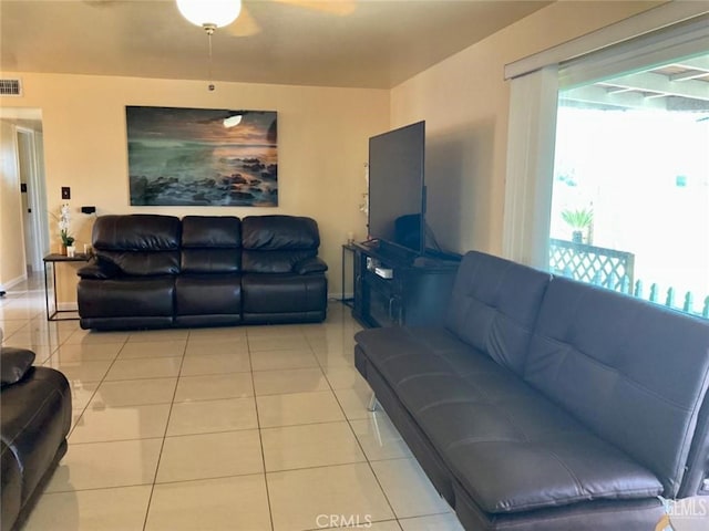2720 Baylor St, Bakersfield, CA 93305 - living room with light tile patterned floors and baseboards