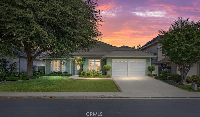 1904 Wedgemont Pl, Bakersfield, CA 93311 - view of front of home featuring a garage, driveway, and a front yard