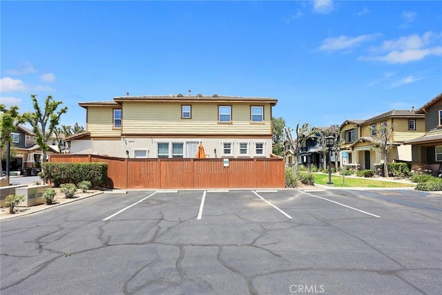 1711 Lordsburg Ct, La Verne, CA 91750 - uncovered parking lot featuring a residential view
