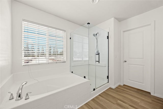 1711 Lordsburg Ct, La Verne, CA 91750 - full bath featuring a shower stall, a garden tub, and wood finished floors
