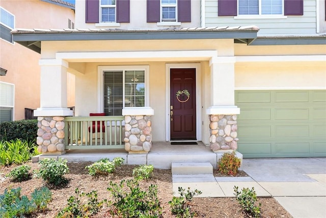 1711 Lordsburg Ct, La Verne, CA 91750 - entrance to property featuring covered porch, stucco siding, concrete driveway, and stone siding