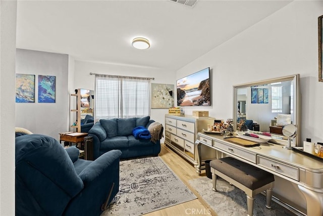 1711 Lordsburg Ct, La Verne, CA 91750 - living room with light wood finished floors and a desk