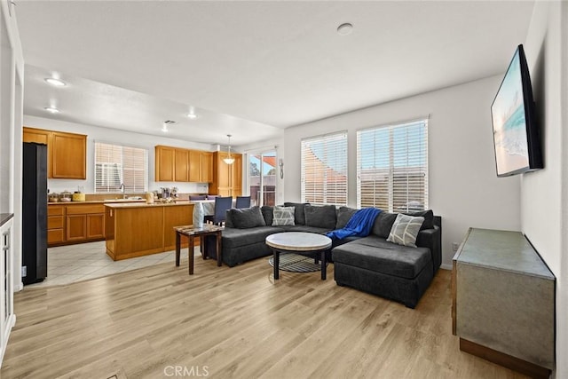 1711 Lordsburg Ct, La Verne, CA 91750 - living room with light wood-type flooring and recessed lighting