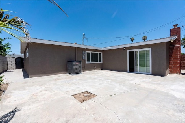 3644 Ardilla Ave, Baldwin Park, CA 91706 - back of property with stucco siding and a patio area