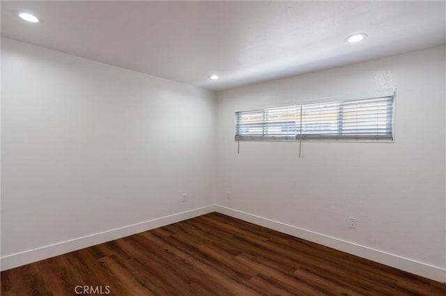 3644 Ardilla Ave, Baldwin Park, CA 91706 - empty room featuring dark wood-type flooring and recessed lighting