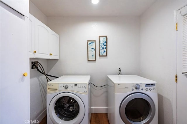 3644 Ardilla Ave, Baldwin Park, CA 91706 - laundry area with washer and clothes dryer, cabinet space, recessed lighting, and wood finished floors