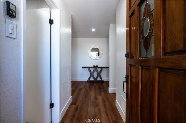 3644 Ardilla Ave, Baldwin Park, CA 91706 - corridor with dark wood-type flooring and recessed lighting